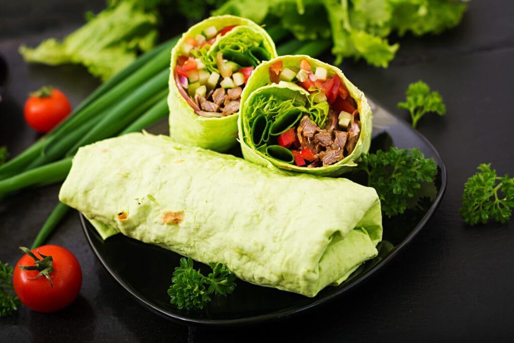 Spinach Tortilla Rolls With Cheese and Smoked Salmon in the Oven: Healthy Recipe Rich in Protein